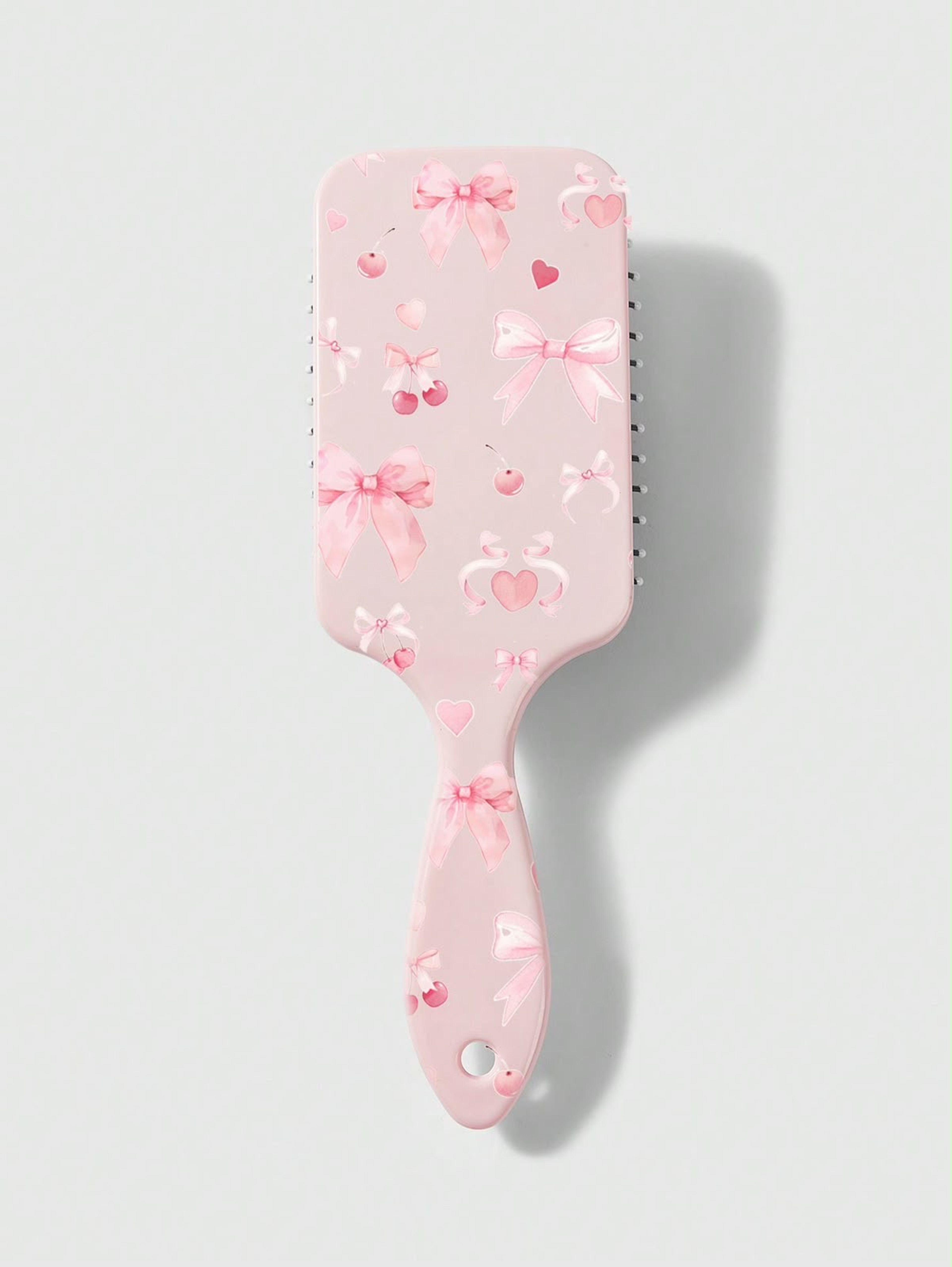 Peines rosa con lazos