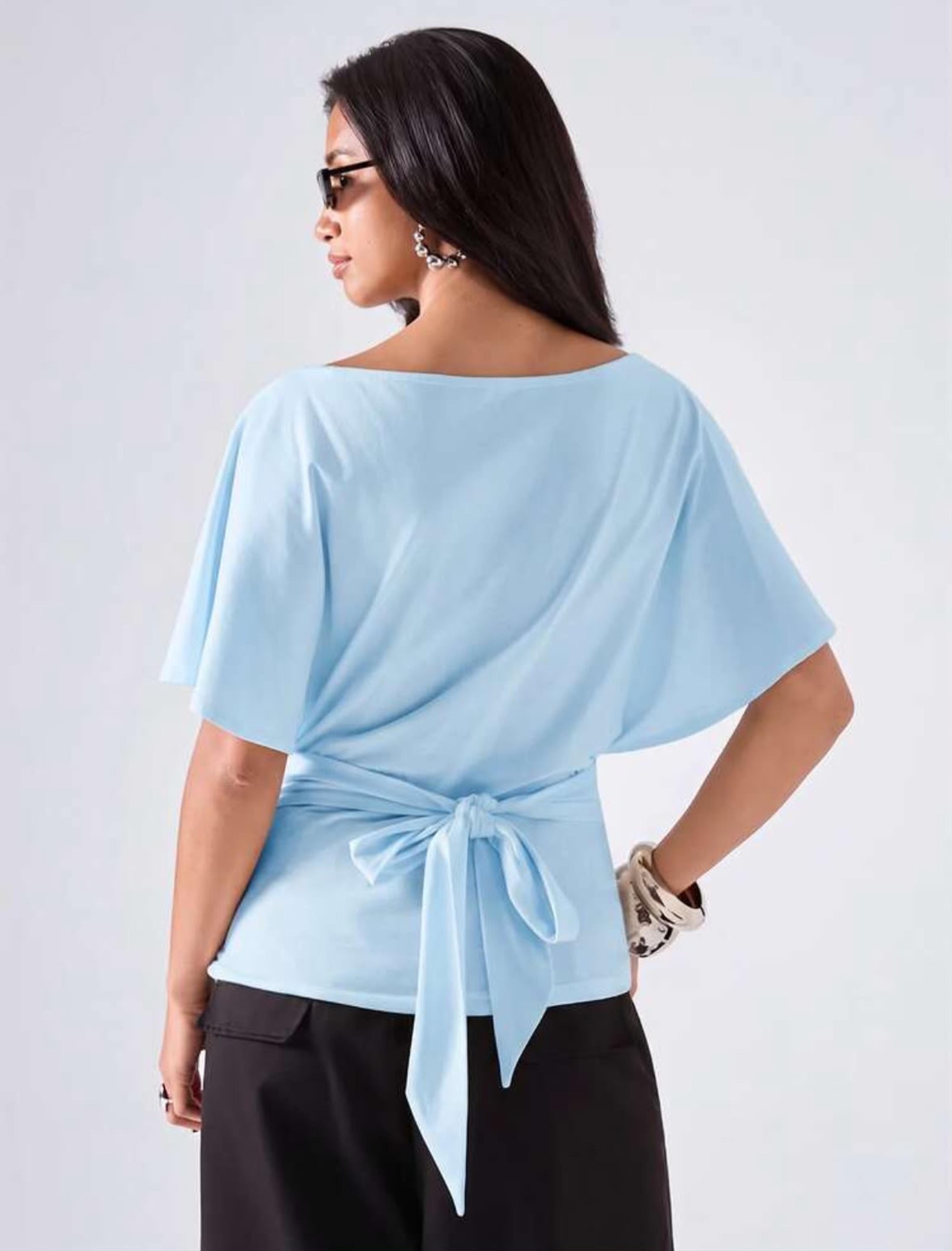 Camisa con mangas boladas y lazo atrás vista 2