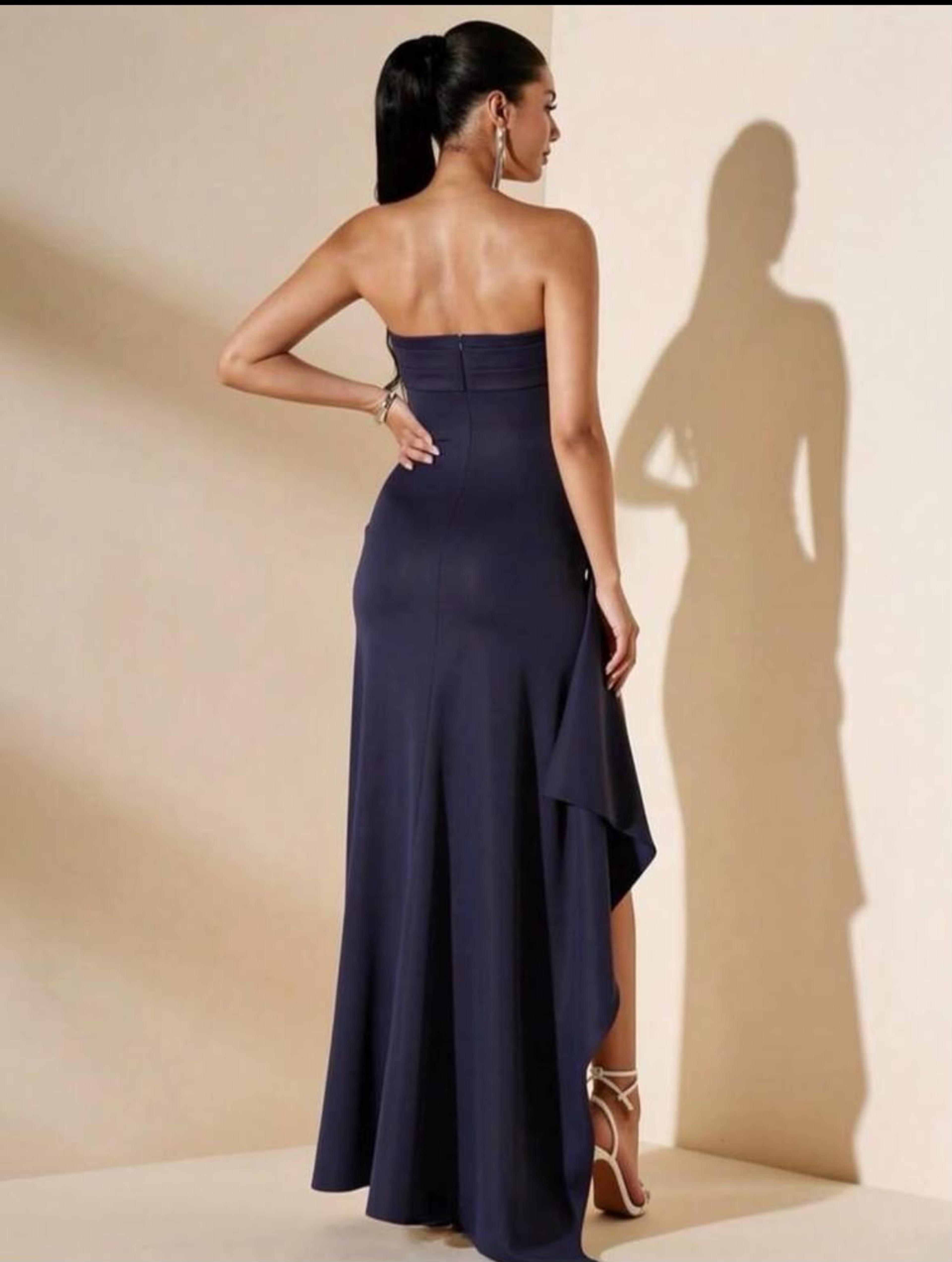 Elegant dress with bare leg view 2