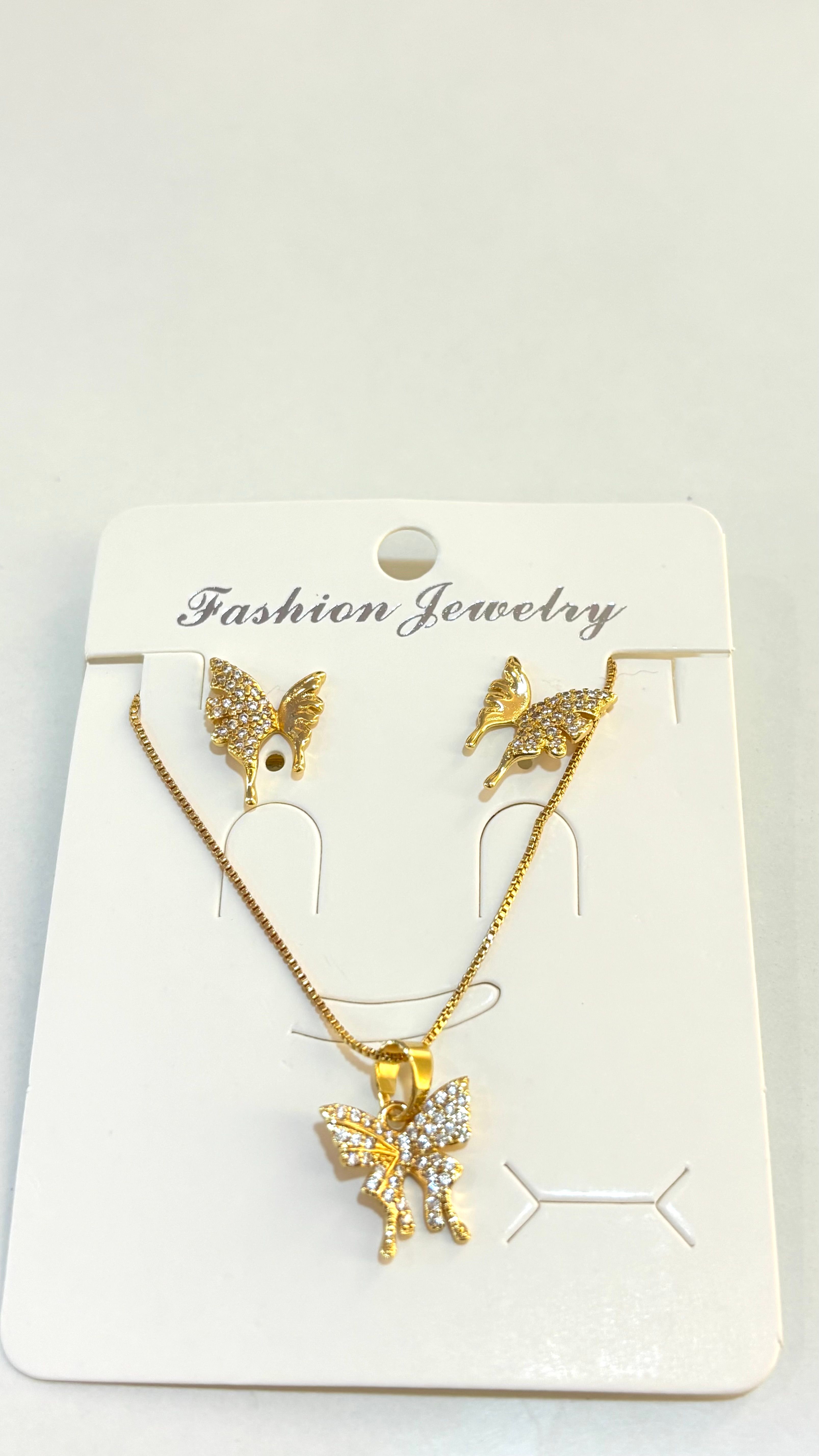 Set of necklace and earring with a sparkling butterfly design