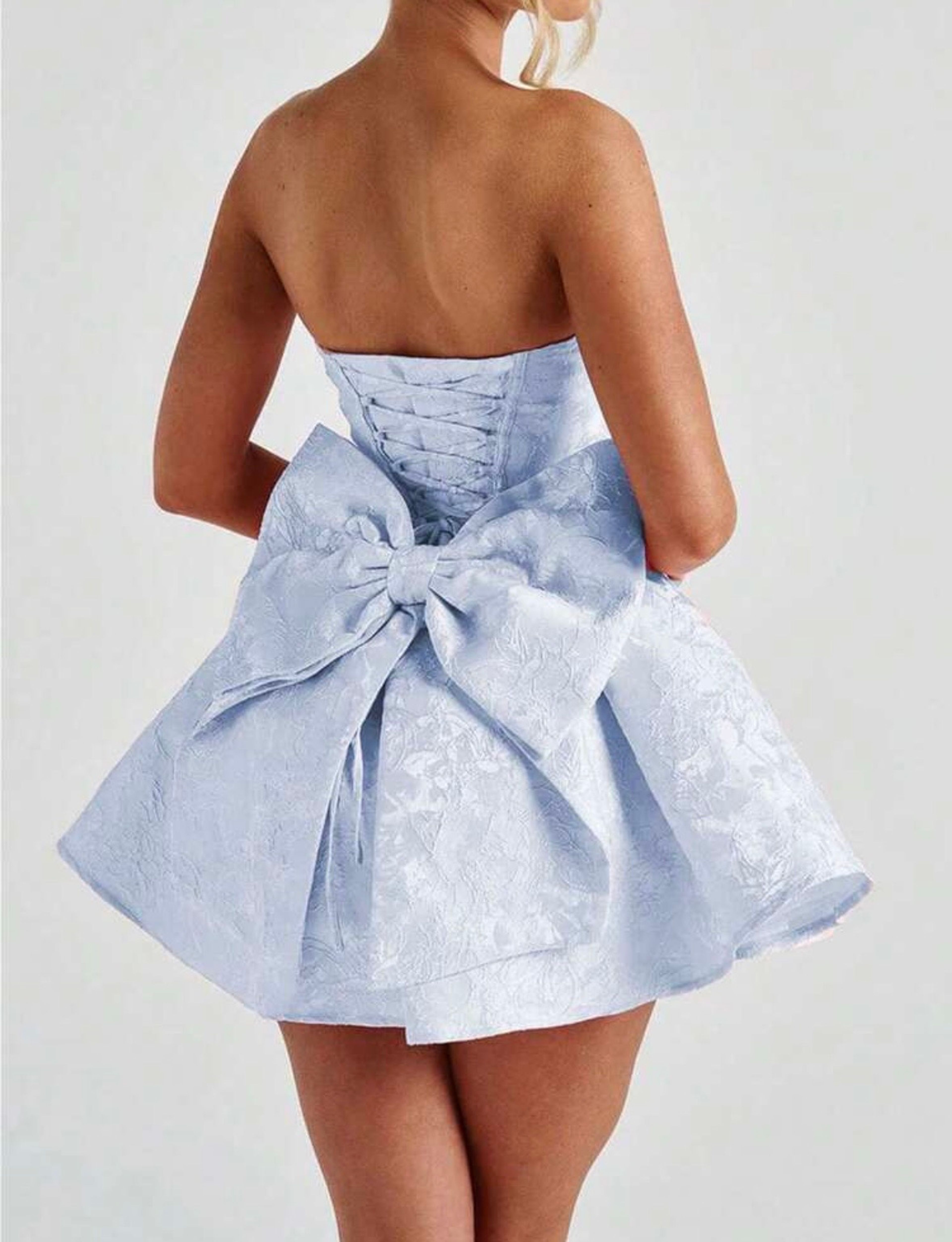 Romantic dress with bow back