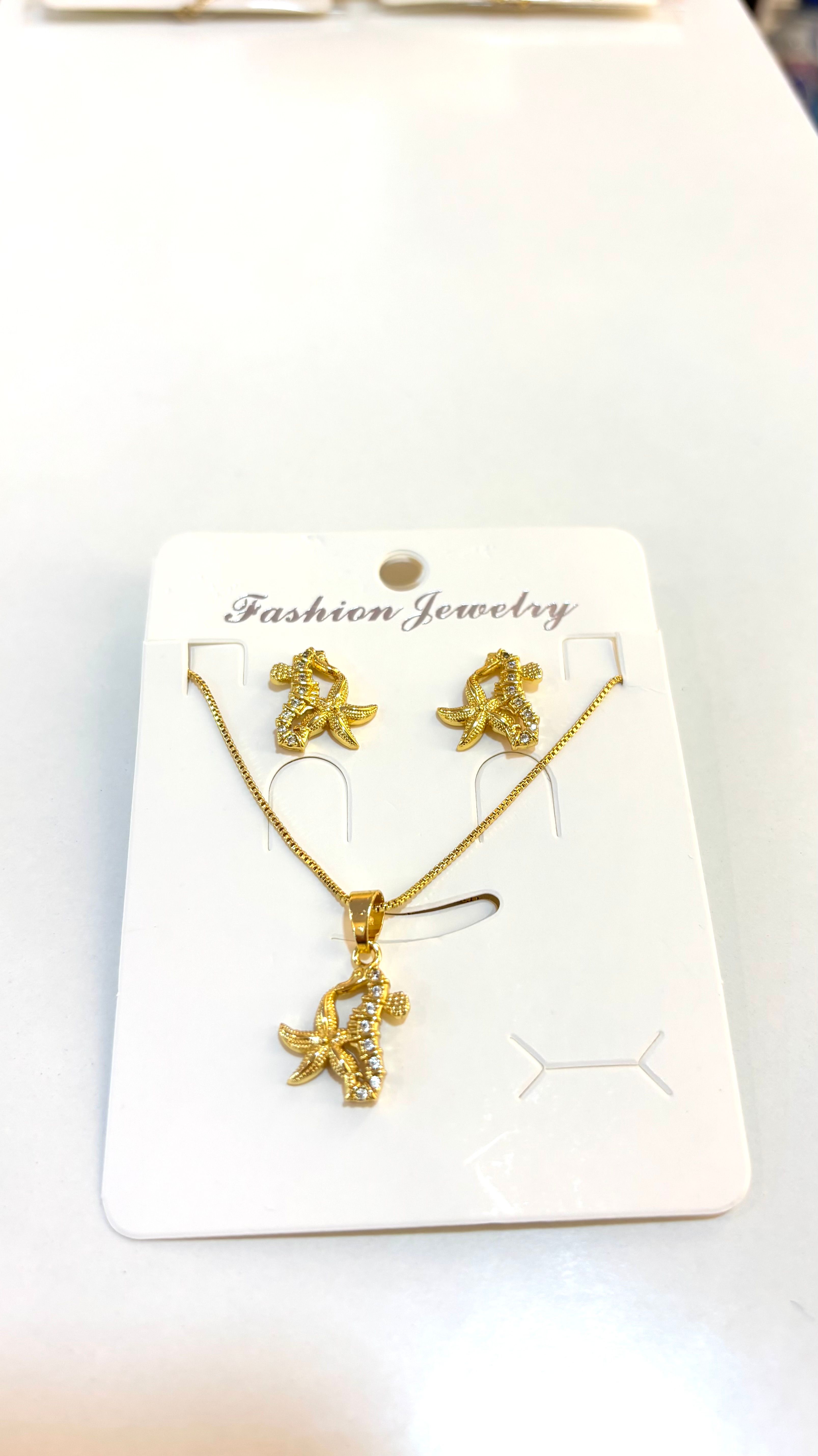 Set cadena con dije estrella de mar   