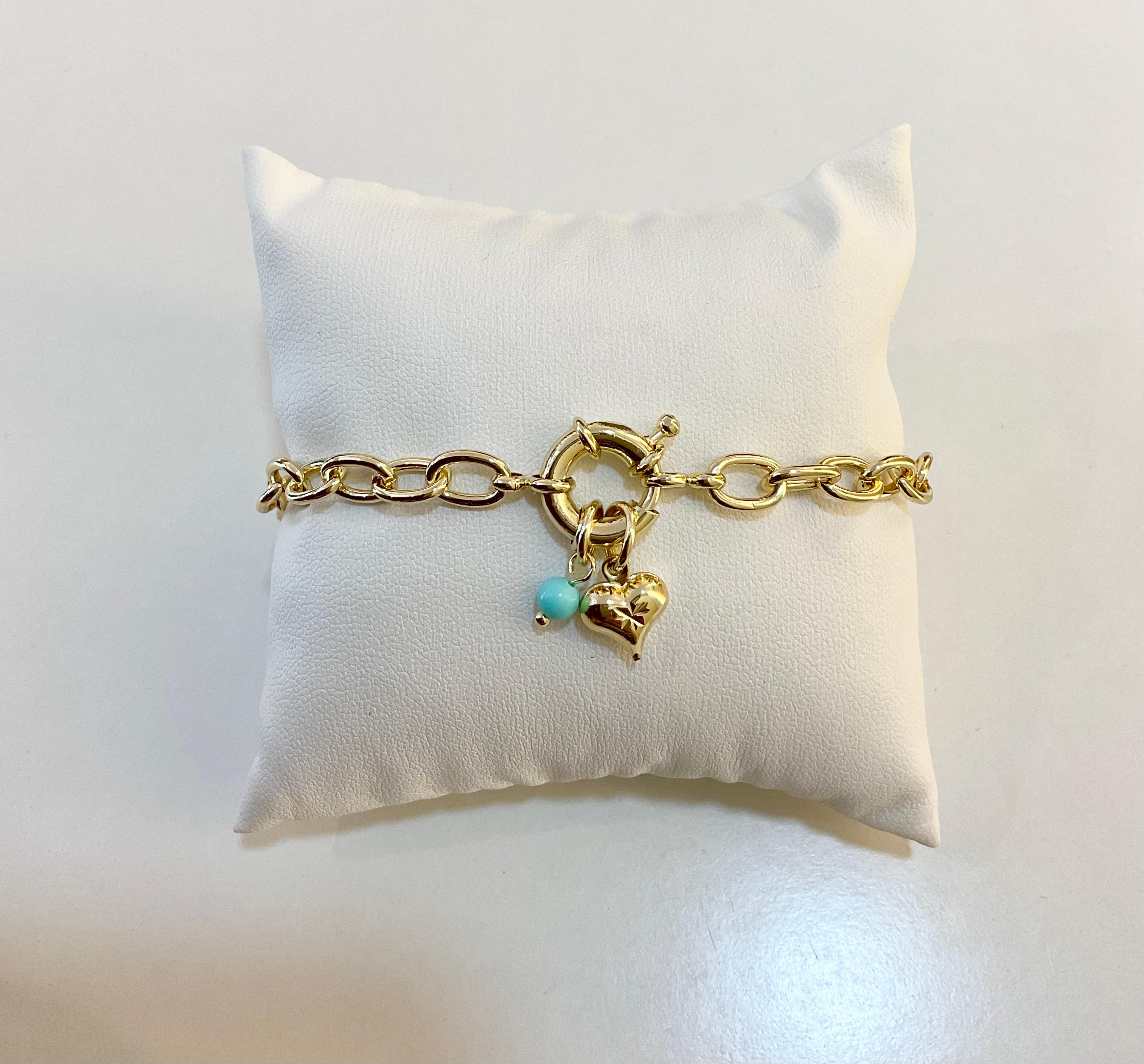 Link bracelet with heart charm