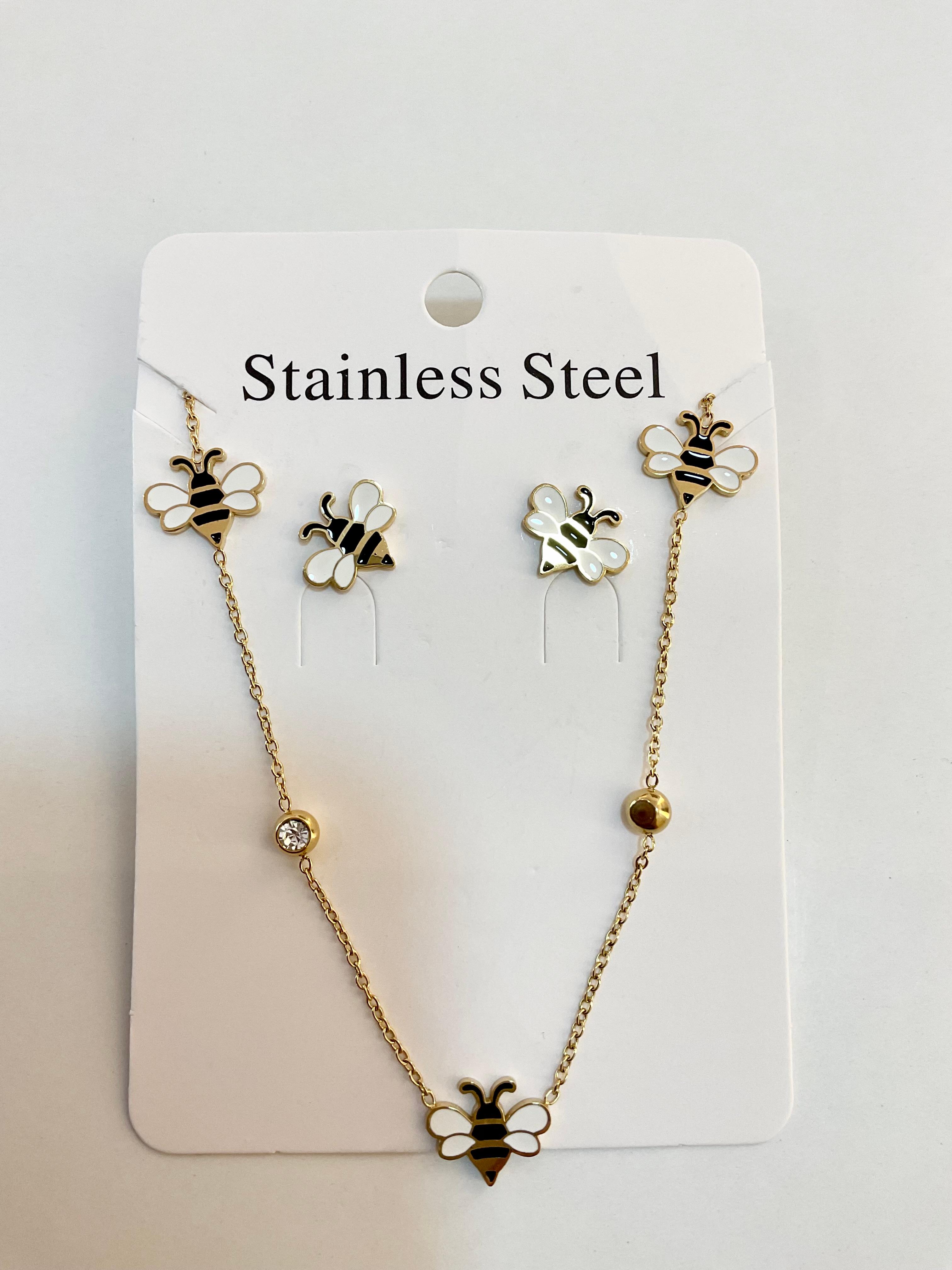 Necklace and earrings with sheep design