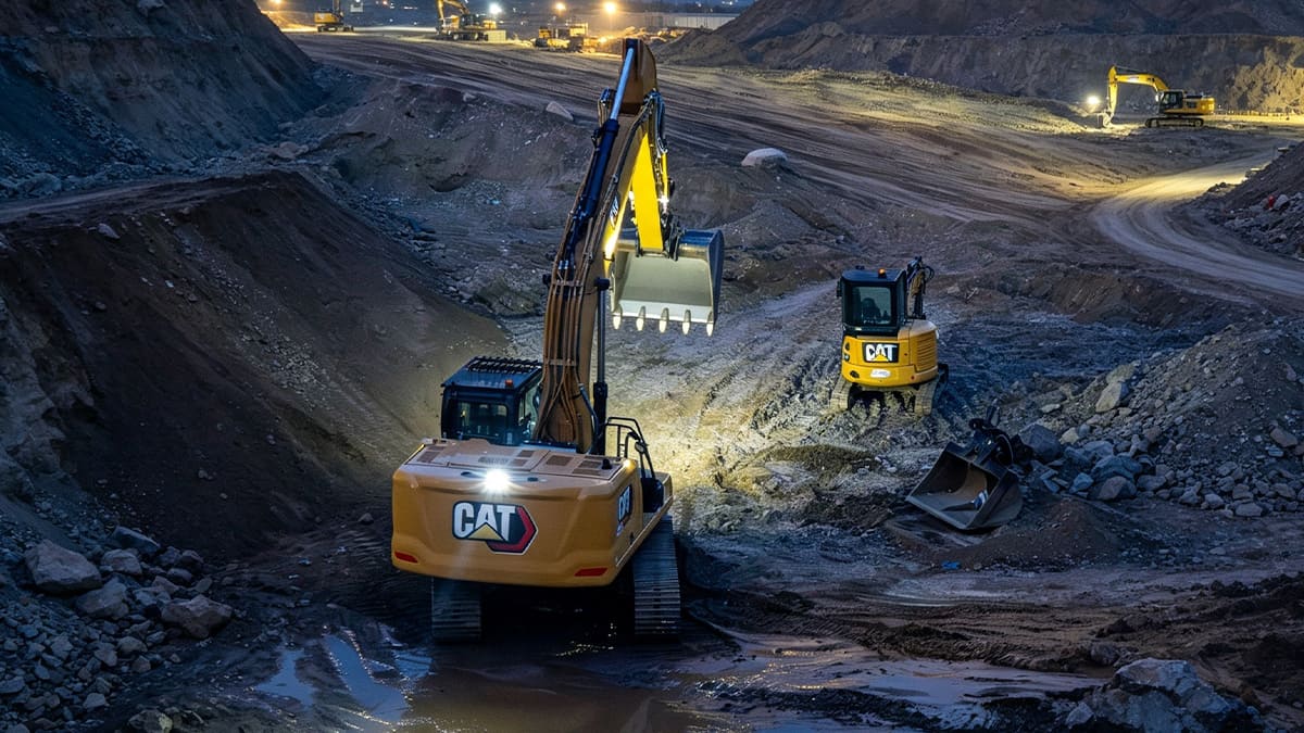 Construction earthmoving equipment with LED work lights at night