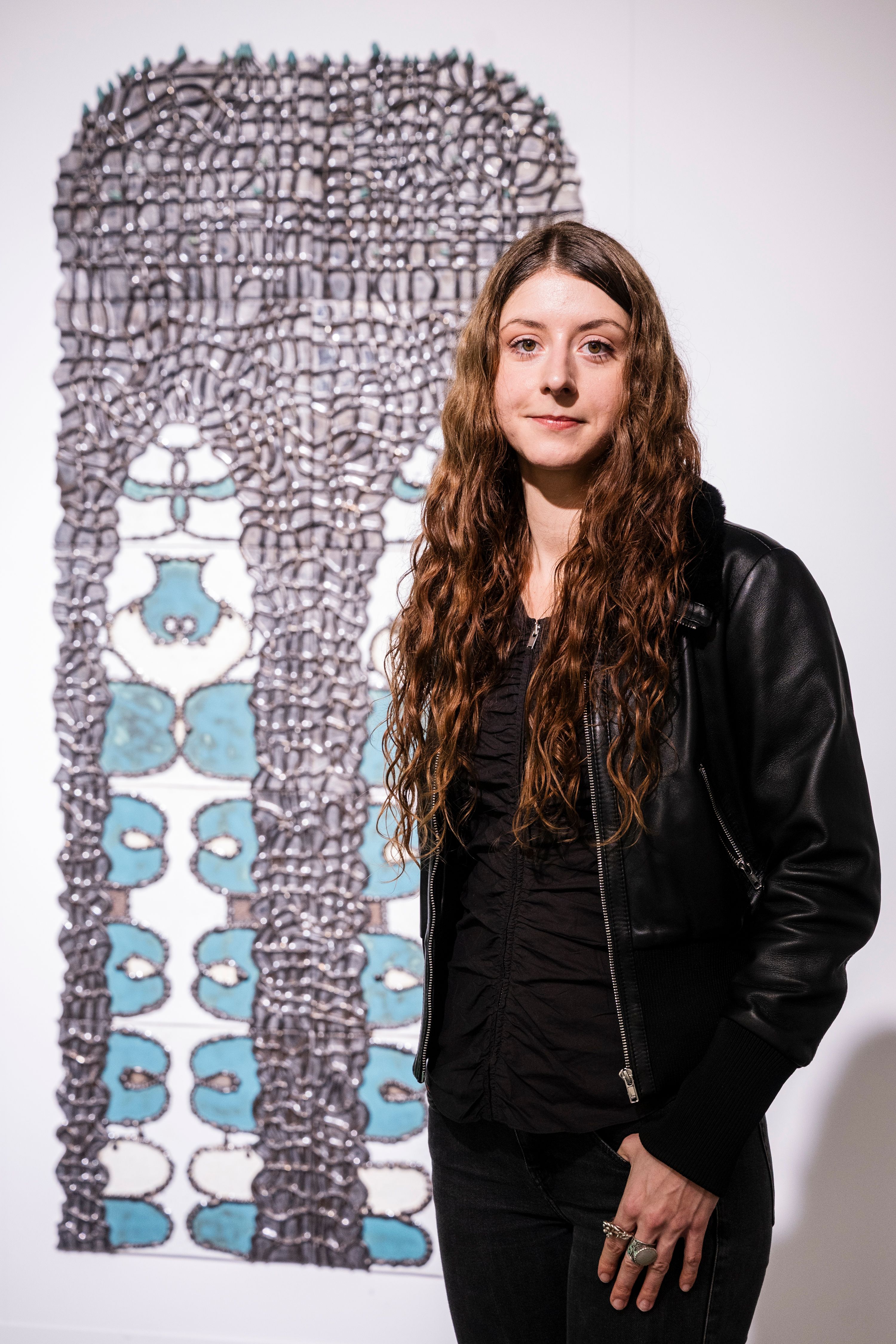 Marie Pic in front of her work of art 