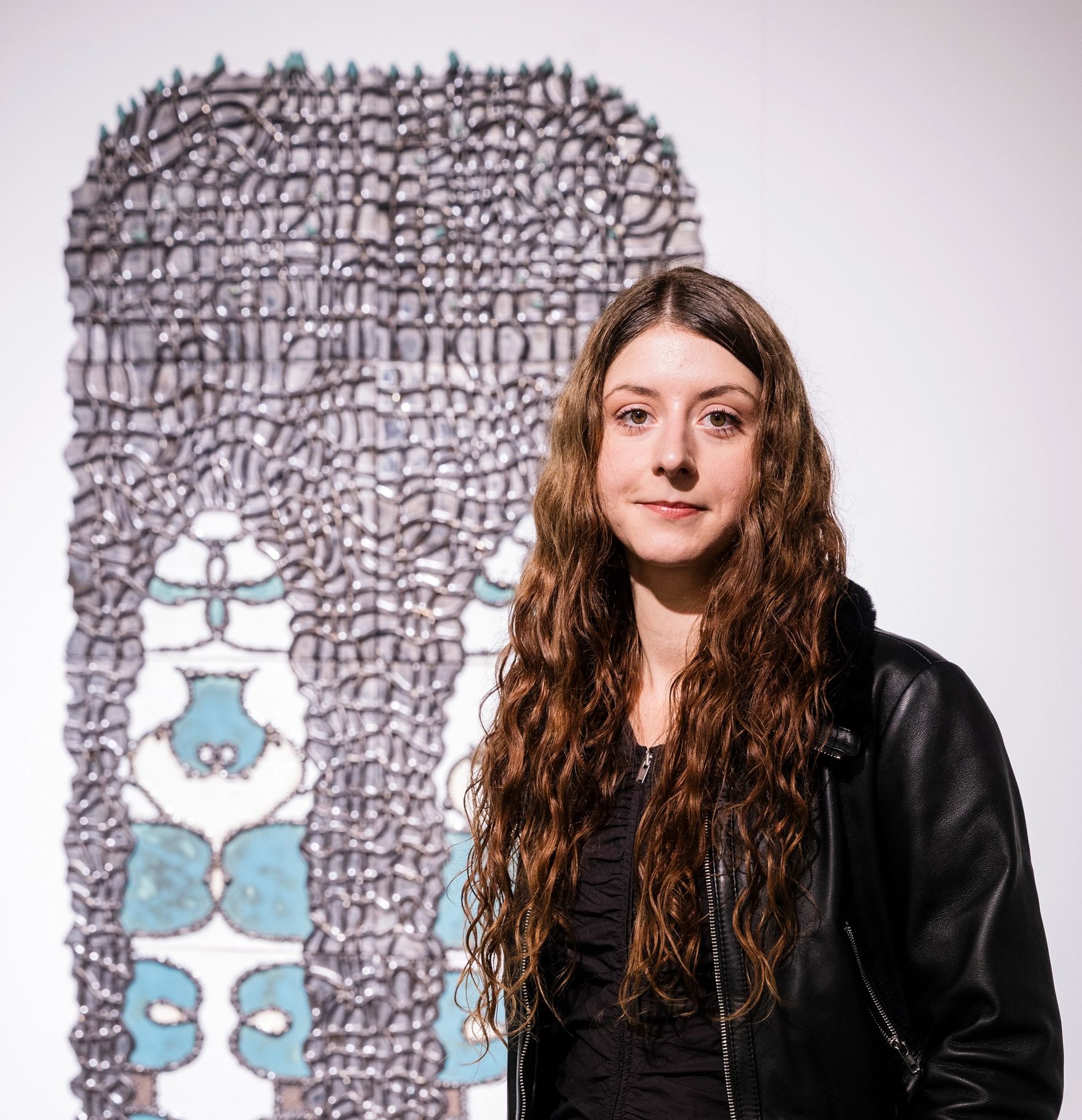 Marie Pic in front of her work of art