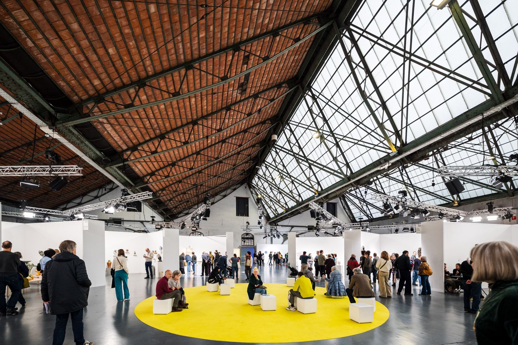 people in front of ceramic work of art 