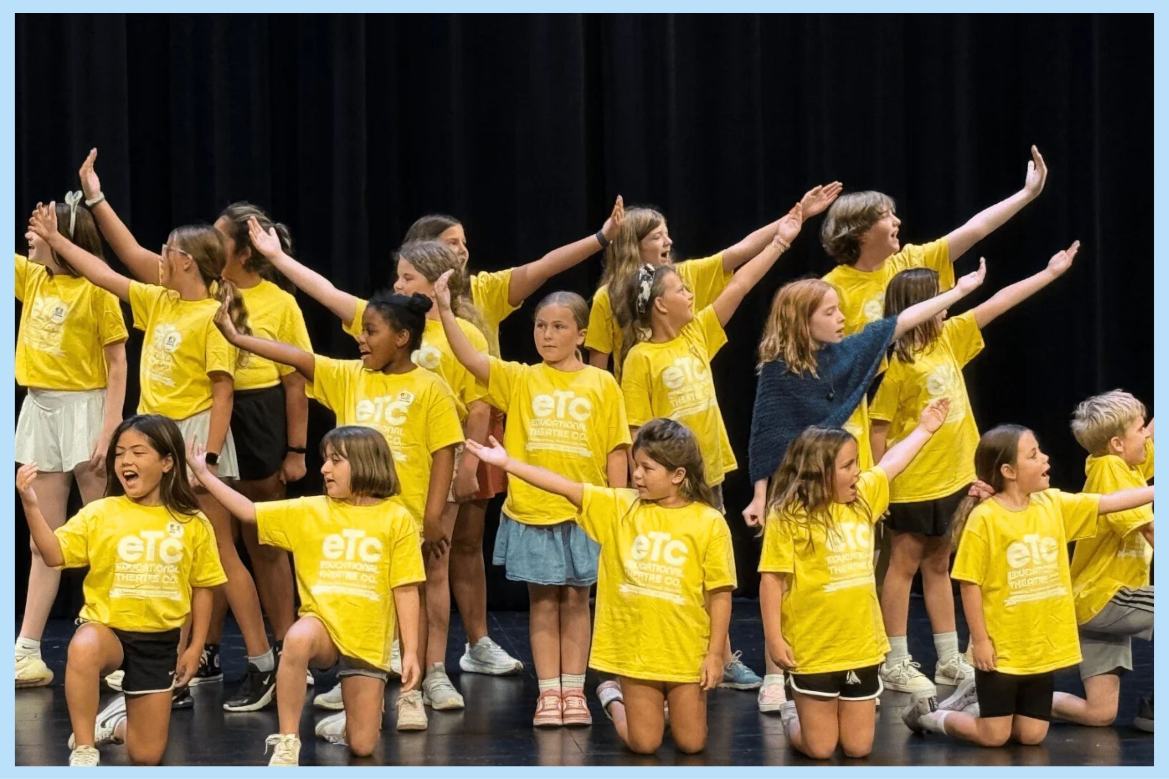 Young actors performing on stage at a children's theatre program in Arlington, Virginia