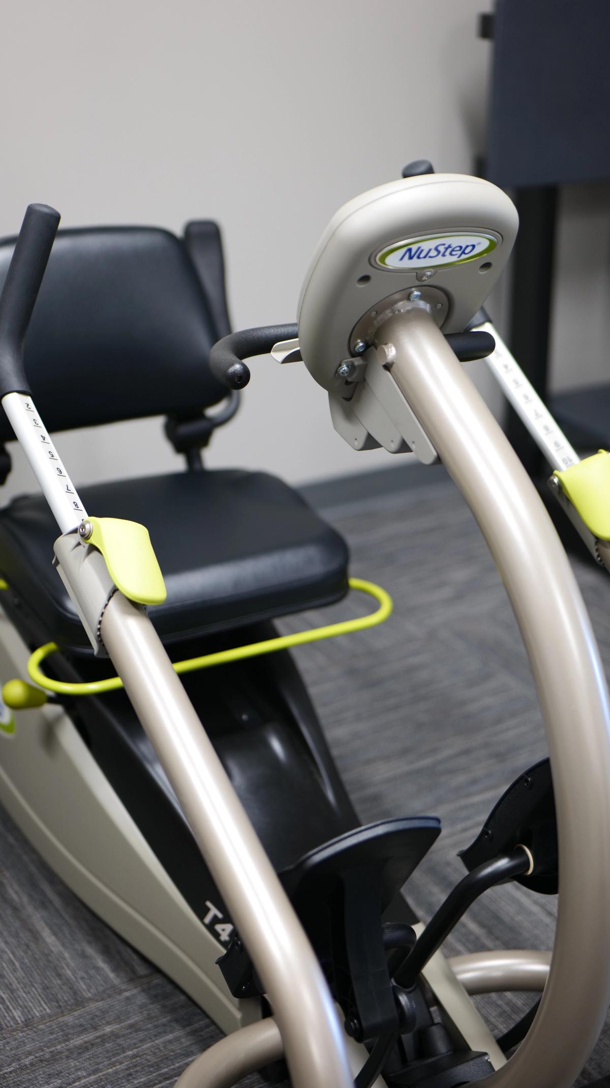 Recumbent cross trainer for low-impact rehabilitation