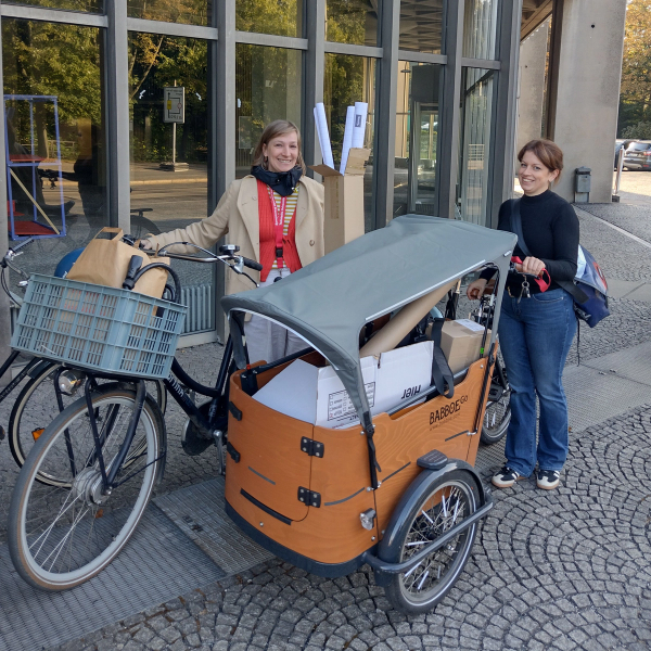 Nora Roesky and Katharina Zickwolf in front of packed bicycles