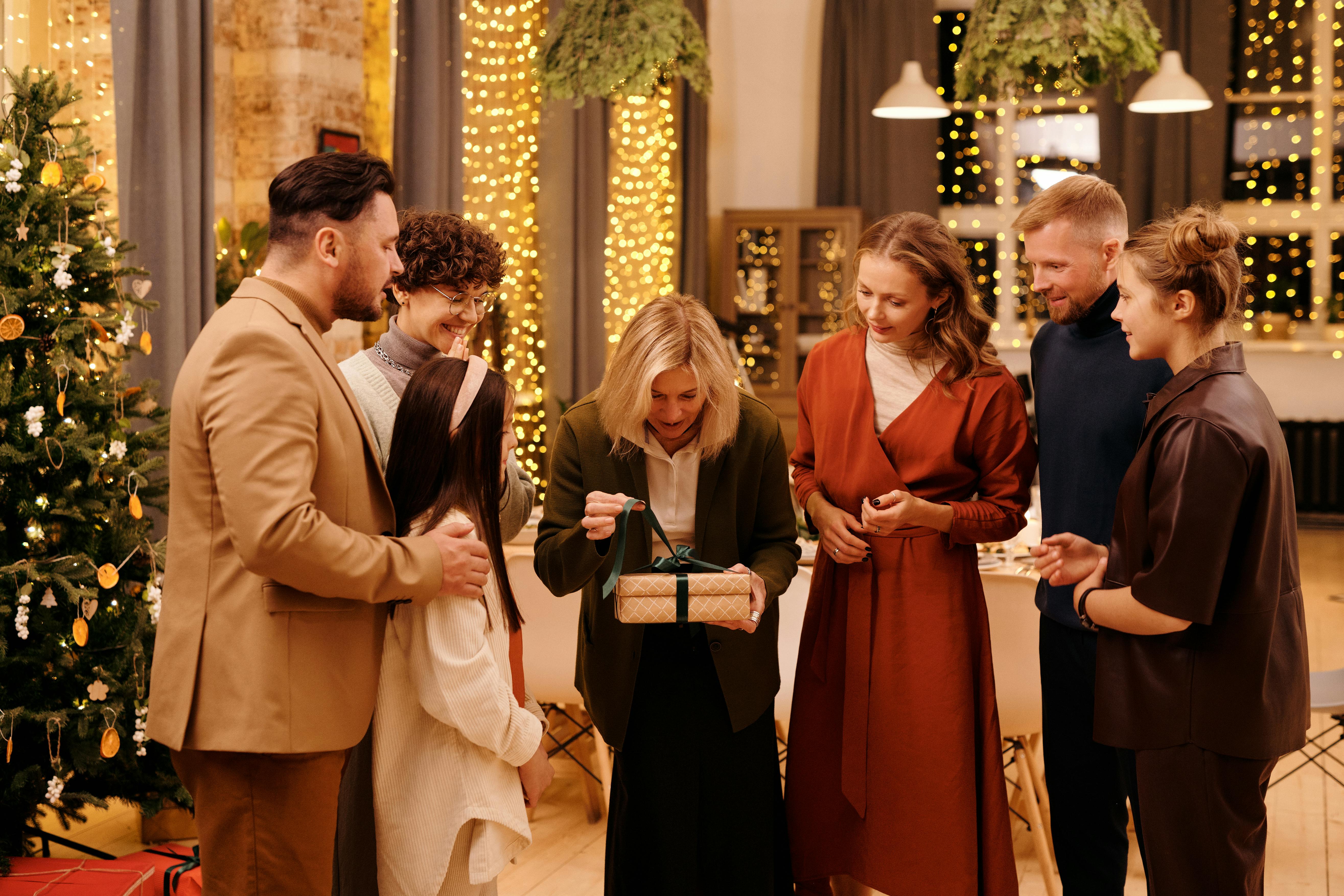 Family sharing holiday gift with Mother in Law