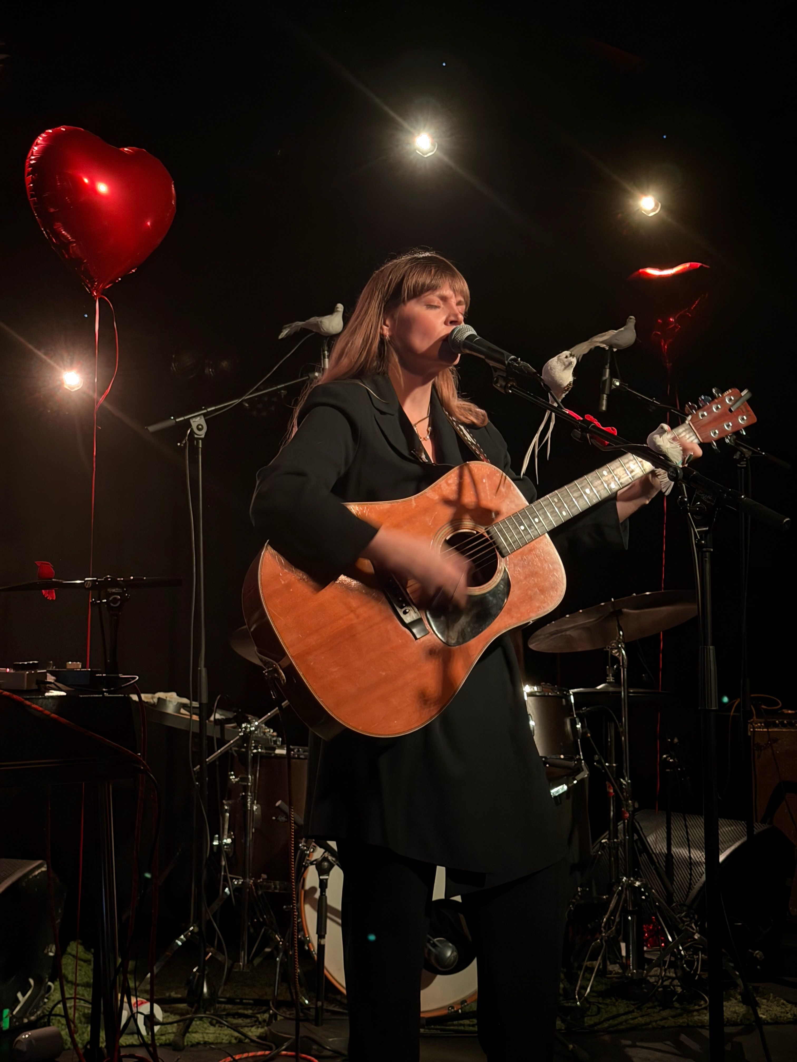 Courtney Marie Andrews with her guitar