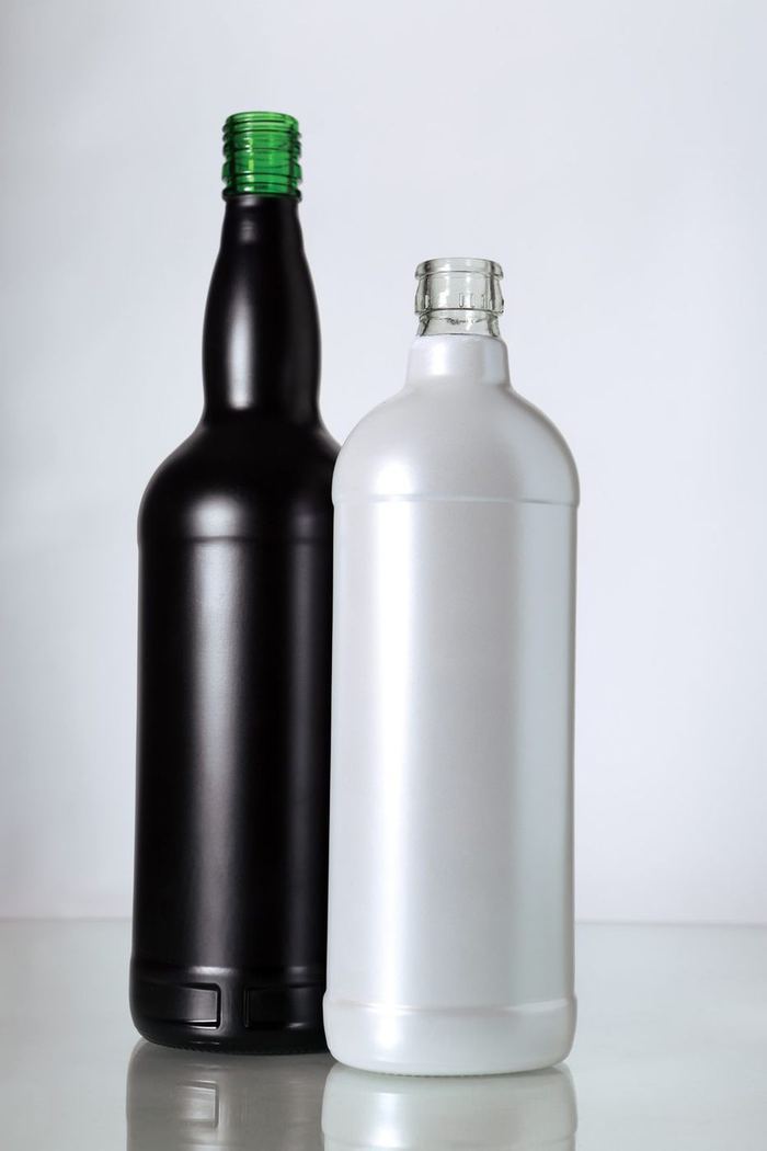 Black and white coated liquor bottles