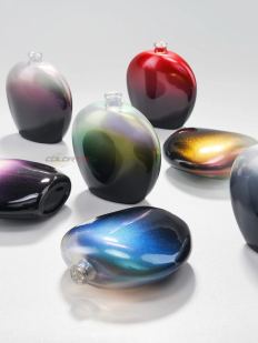 Perfume bottles in iridescent ombre finishes
