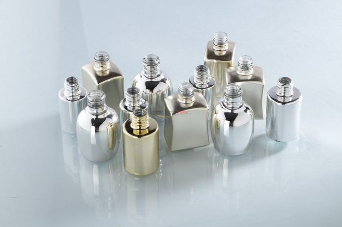 Group of small glass bottles with mirror-finish vacuum metalizing