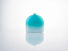 Teal coated glass bottle