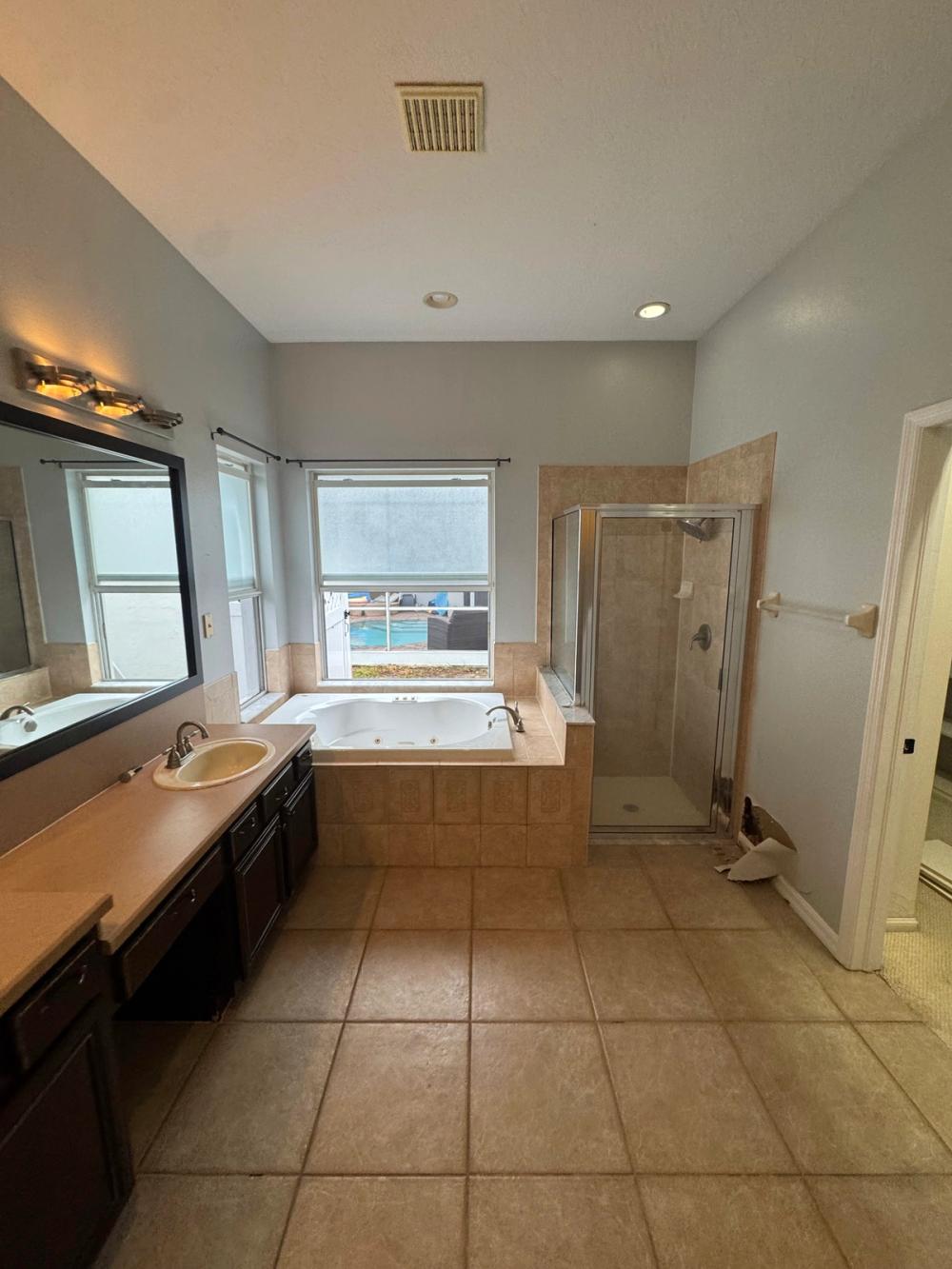 Warm Primary Bathroom Remodel, before