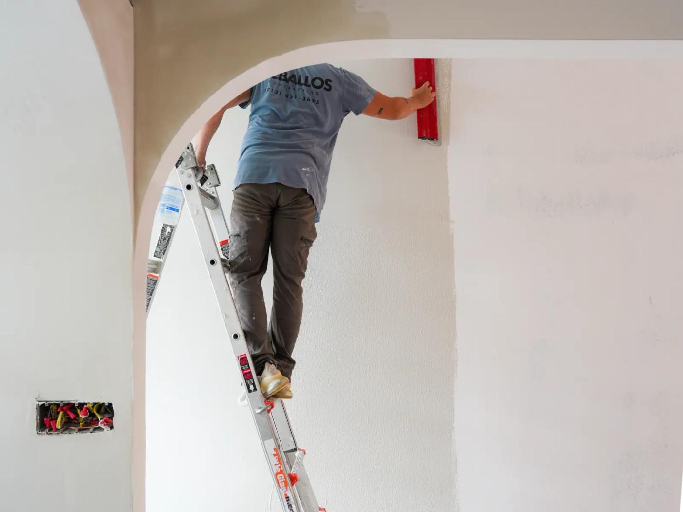 Applying microcement to a showroom wall