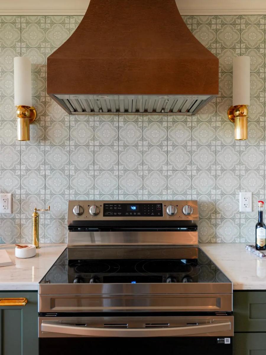 Hand-finished copper hood above a stainless range