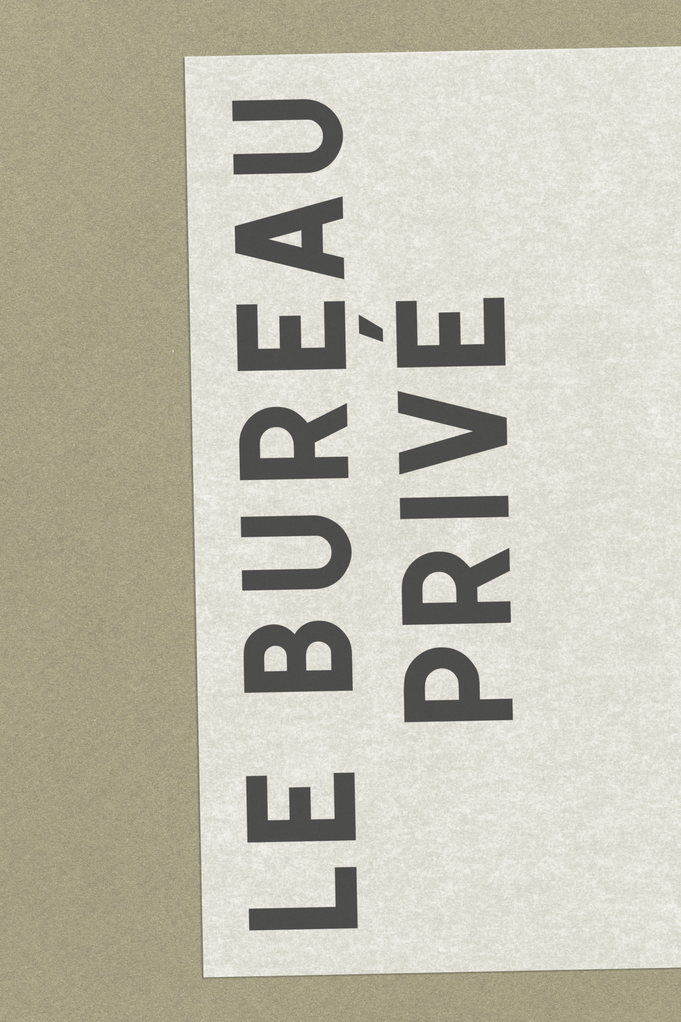Sand colored cover with the "Le Bureau Privé" wordmark set vertically in bold black type on a textured vellum paper.