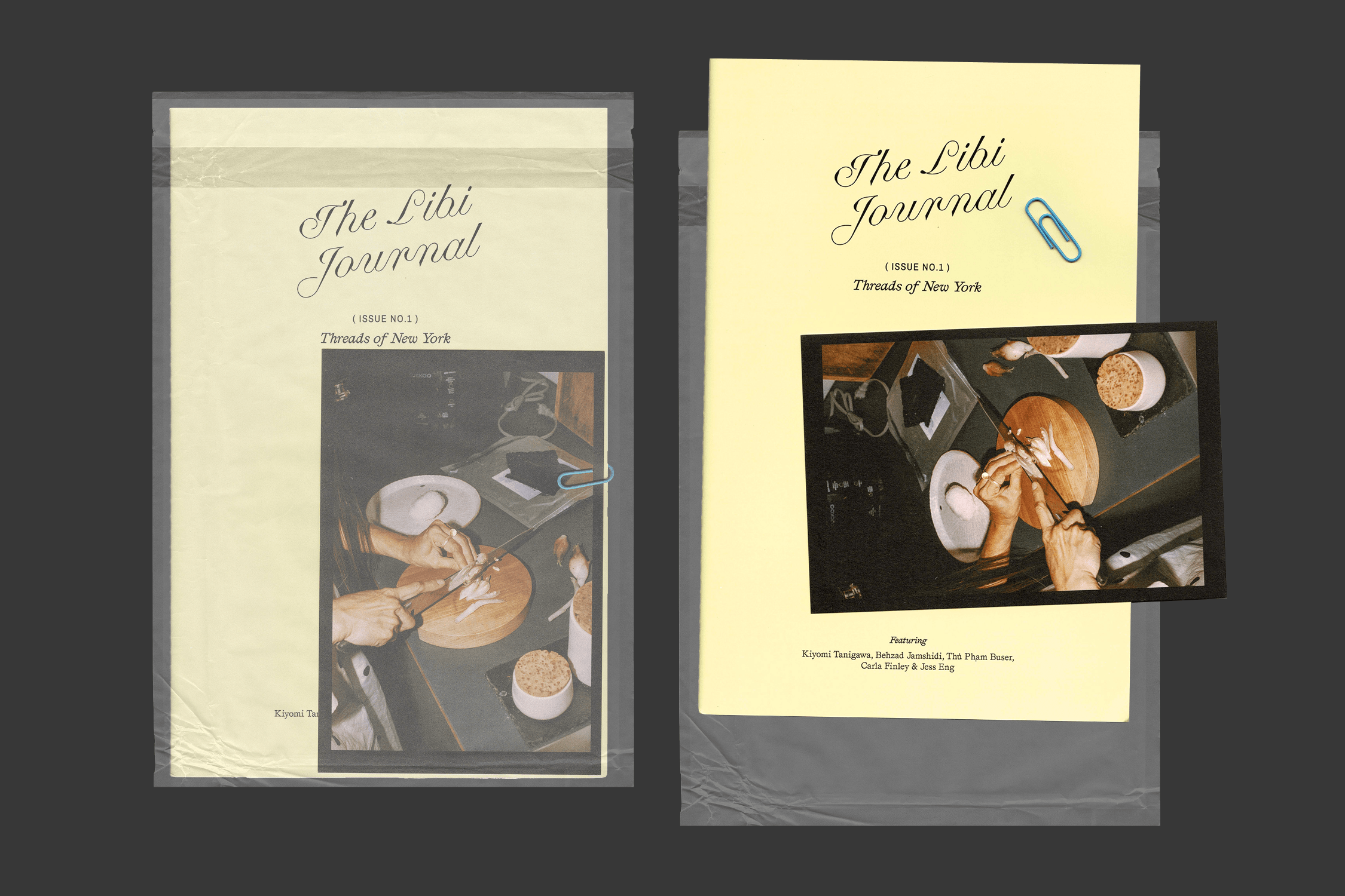 Two views of the journal sealed in a clear wax paper bag — one showing the front cover, one showing the cover tilted with a blue paperclip and a photo insert of hands slicing food on a cutting board.