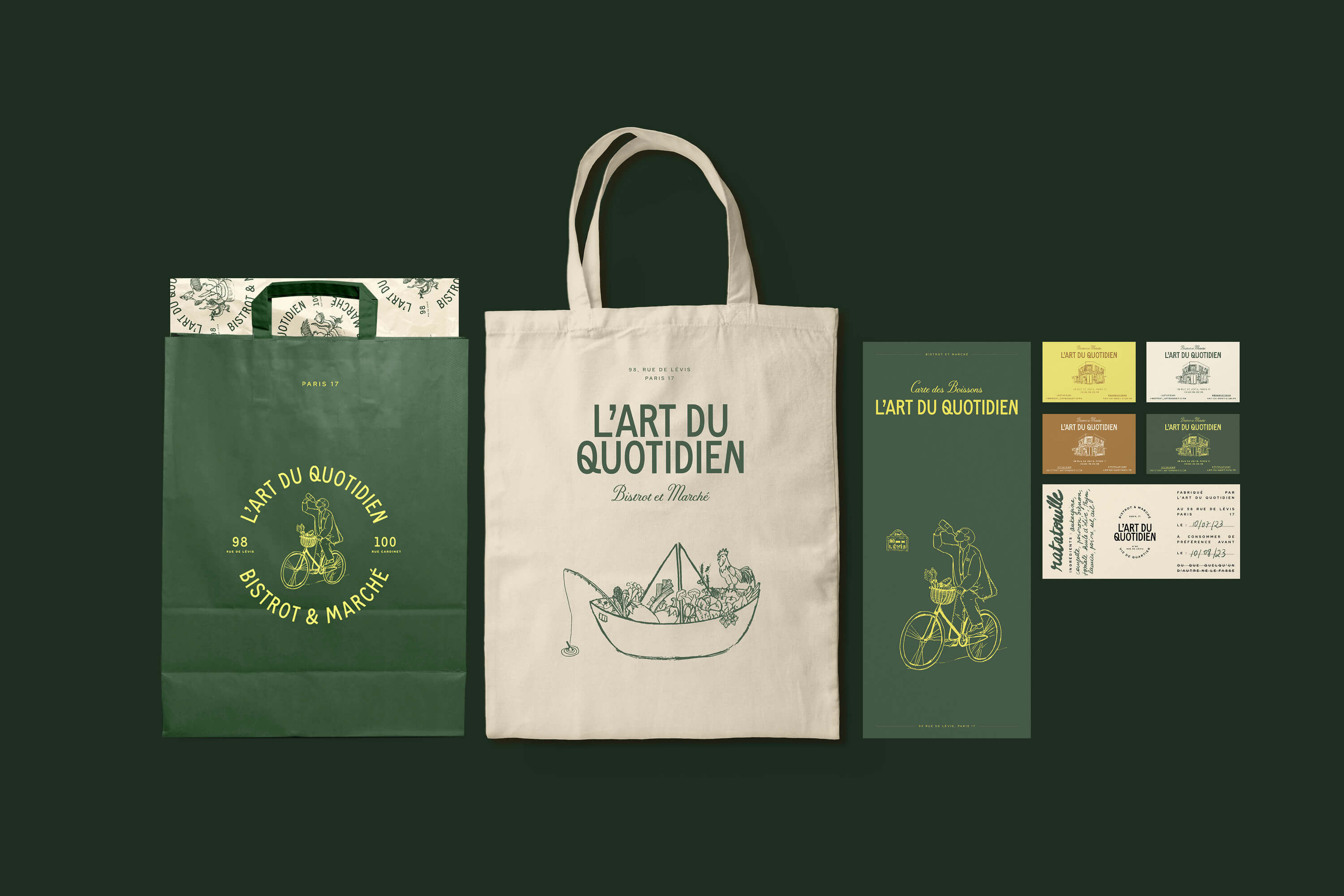 Dark green background displaying the full brand suite — a paper carrier bag, tote bag with a boat/market illustration, packaging box, and a set of business cards, all in the green, cream, and yellow palette.