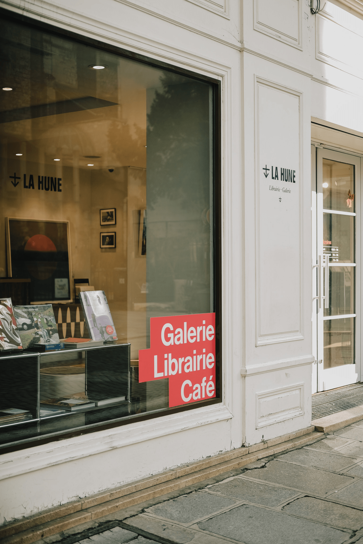 La Hune storefront with "Galerie Librairie Café" signage on the window