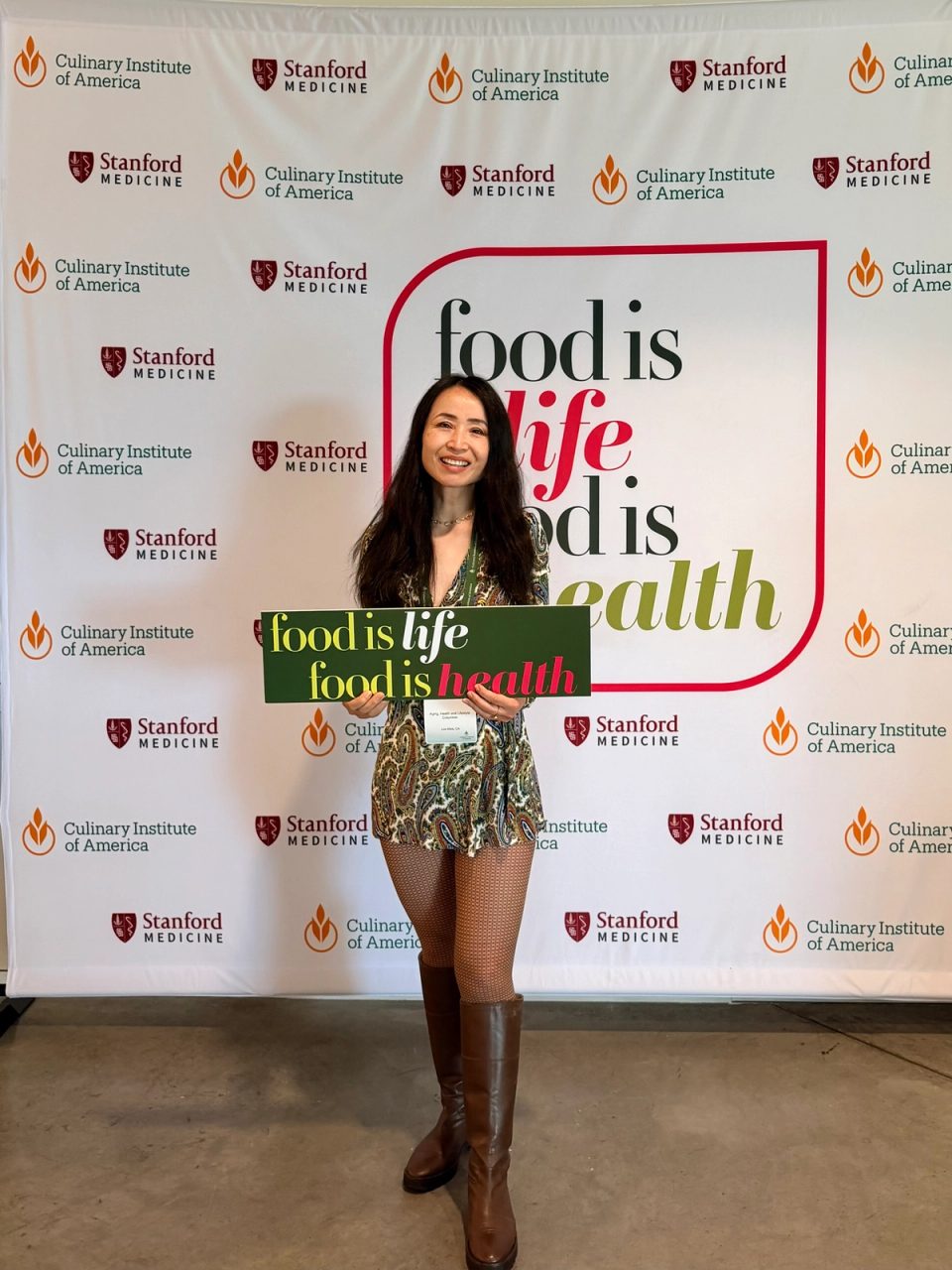 Duanni Hurd attending Foot is Life Food is Health Conference by Culinary Institute of America and Stanford Medicine providing media content coverage