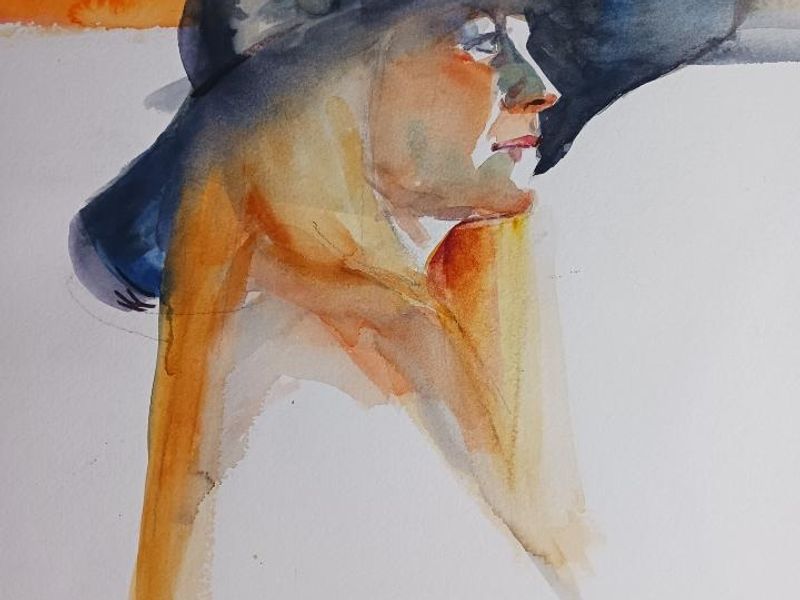 Watercolor portrait of a girl in a wide-brimmed hat
