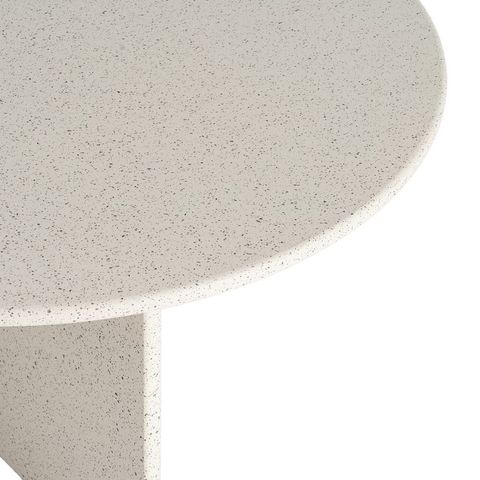 Mesa de centro blanca con base abierta, detalle del acabado