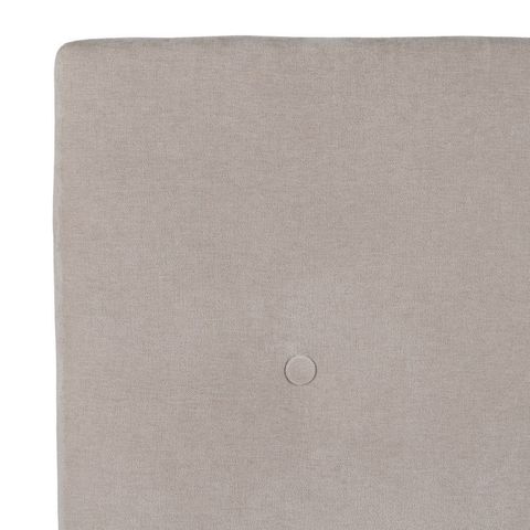 Cabecero crema con capitoné, detalle del capitoné