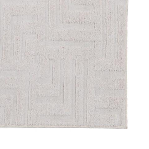 Alfombra geométrica cruda de líneas — detalle