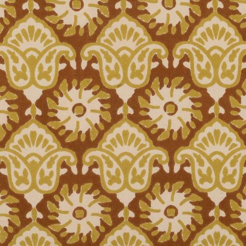 Cojín beige y marrón de medallones — detalle