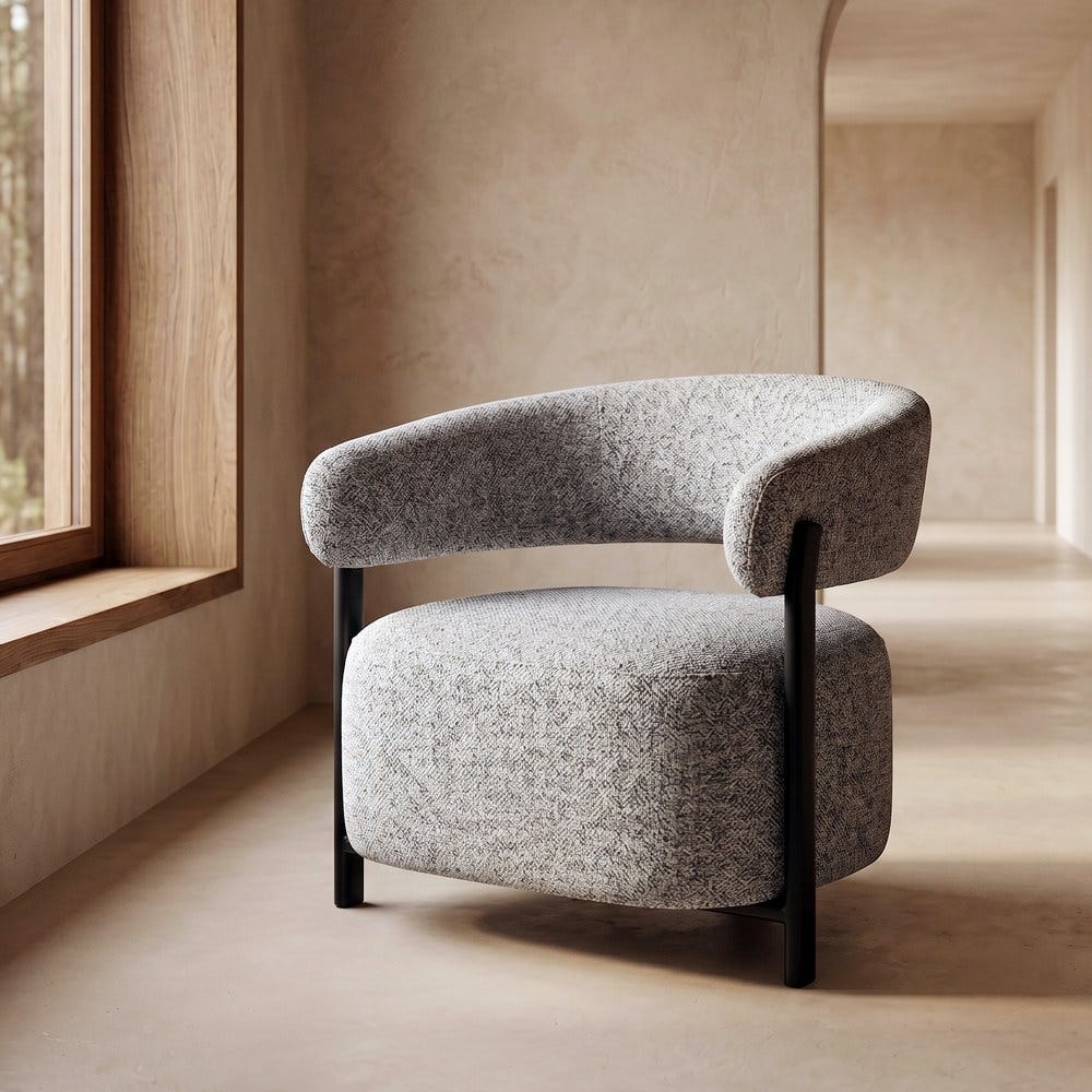 Sillón gris tapizado de respaldo bajo