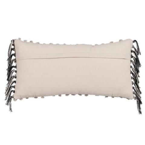 Reverso del cojín beige y negro con borlas