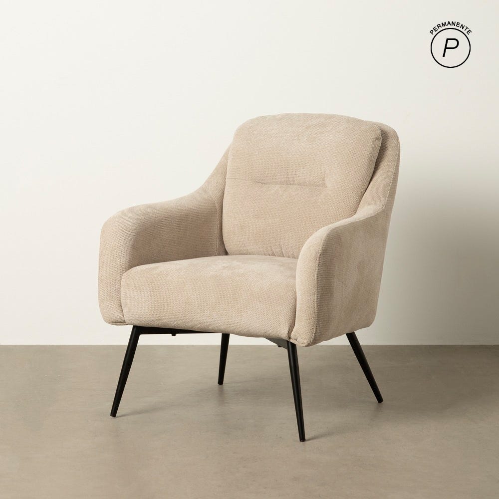 Sillón beige de brazos tapizados