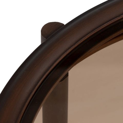 Mesa de centro marrón oscuro de cristal y hierro, detalle del borde