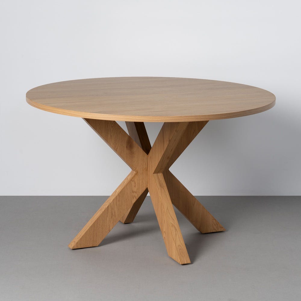 Mesa de comedor redonda con base cruzada