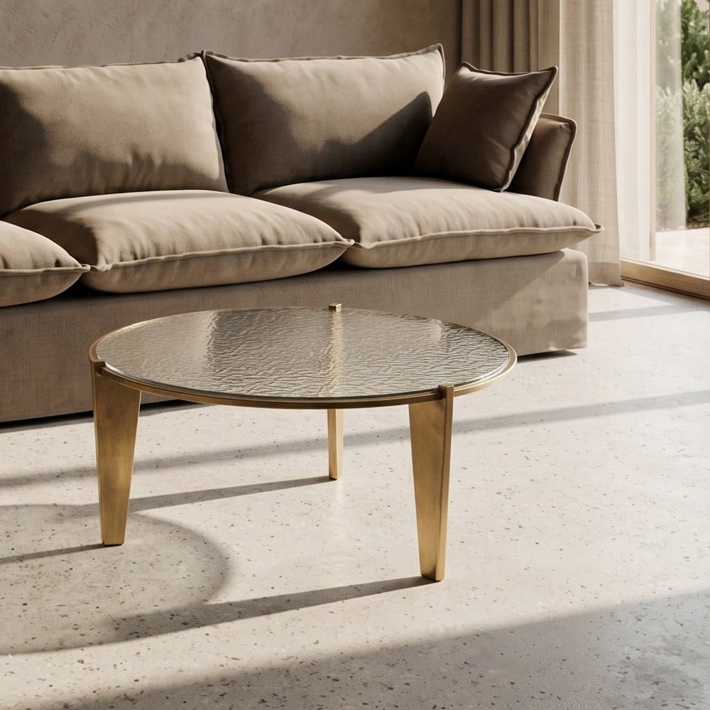 Mesa de centro de cristal y oro viejo