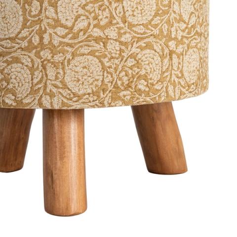 Detalle de las patas de bambú y el borde del tapizado