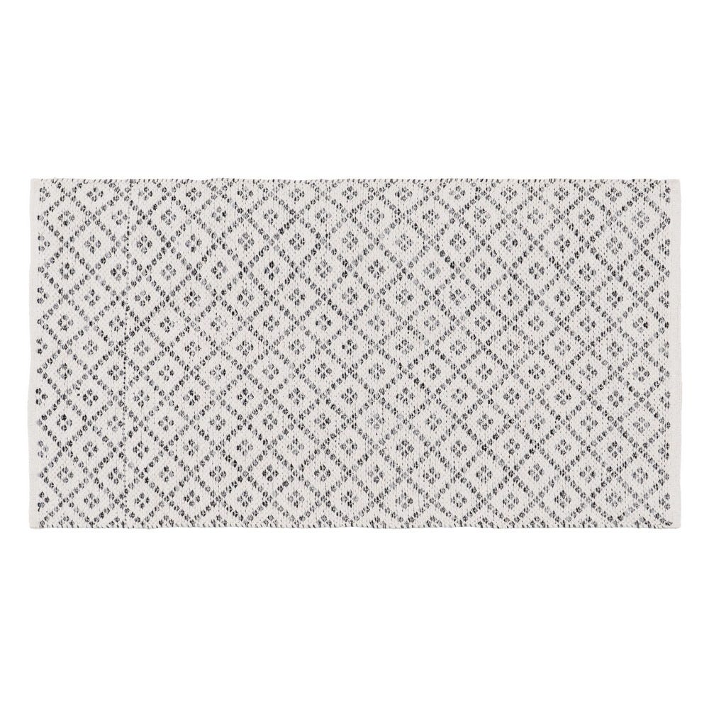 Alfombra blanca y gris con dibujo de rombos