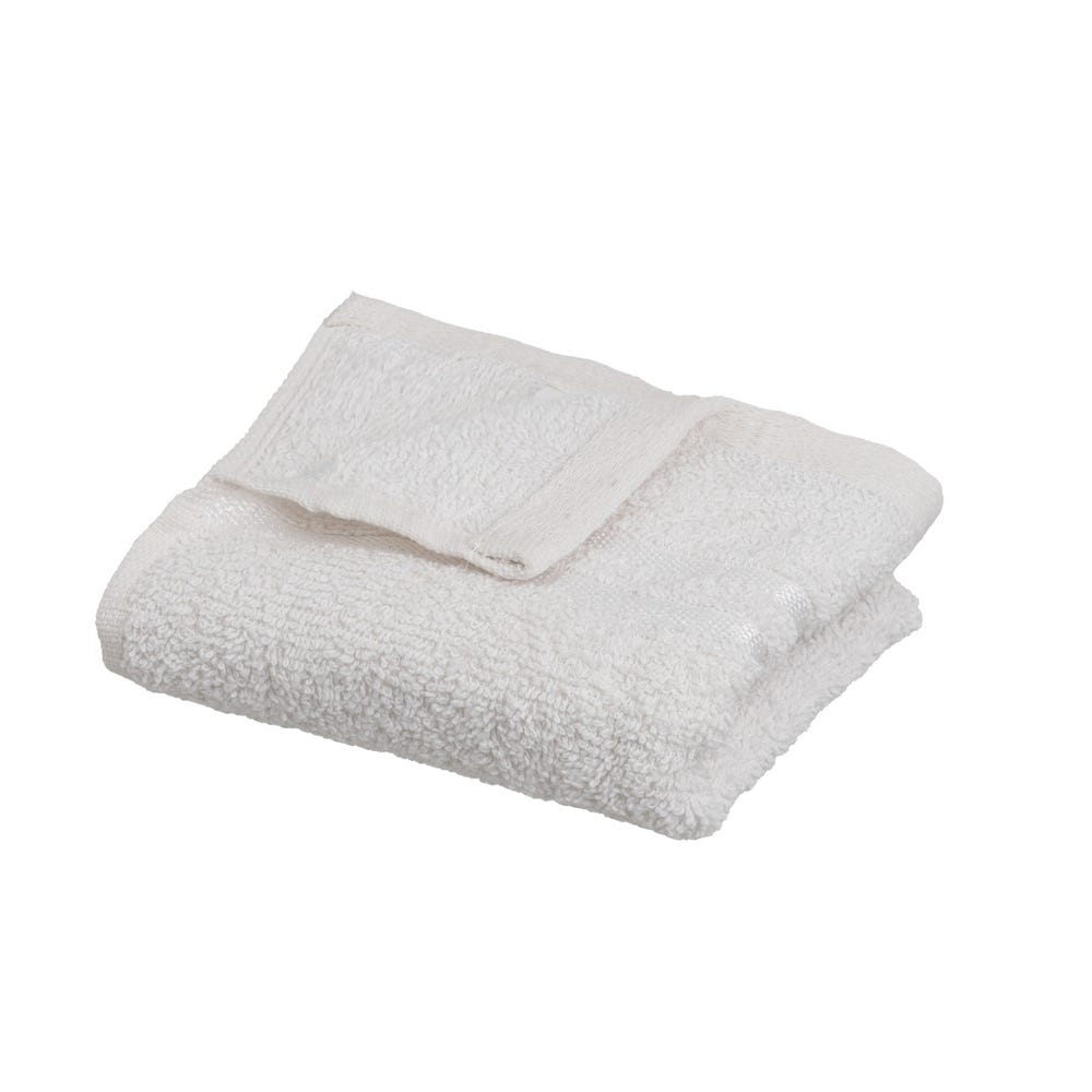 Toalla blanca de tocador doblada