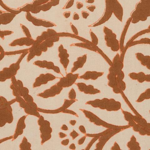 Cojín beige y marrón de flores — detalle