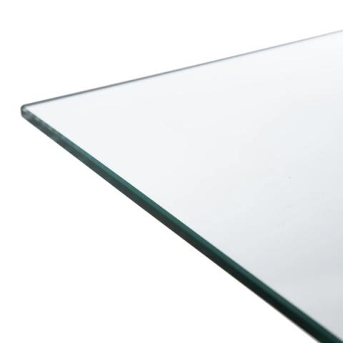 Mesa de comedor de cristal con patas negras, detalle del cristal