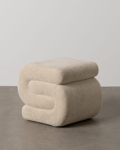 Puf beige de bucle lateral