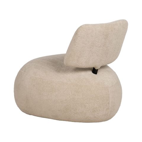 Vista posterior del sillón beige de respaldo flotante