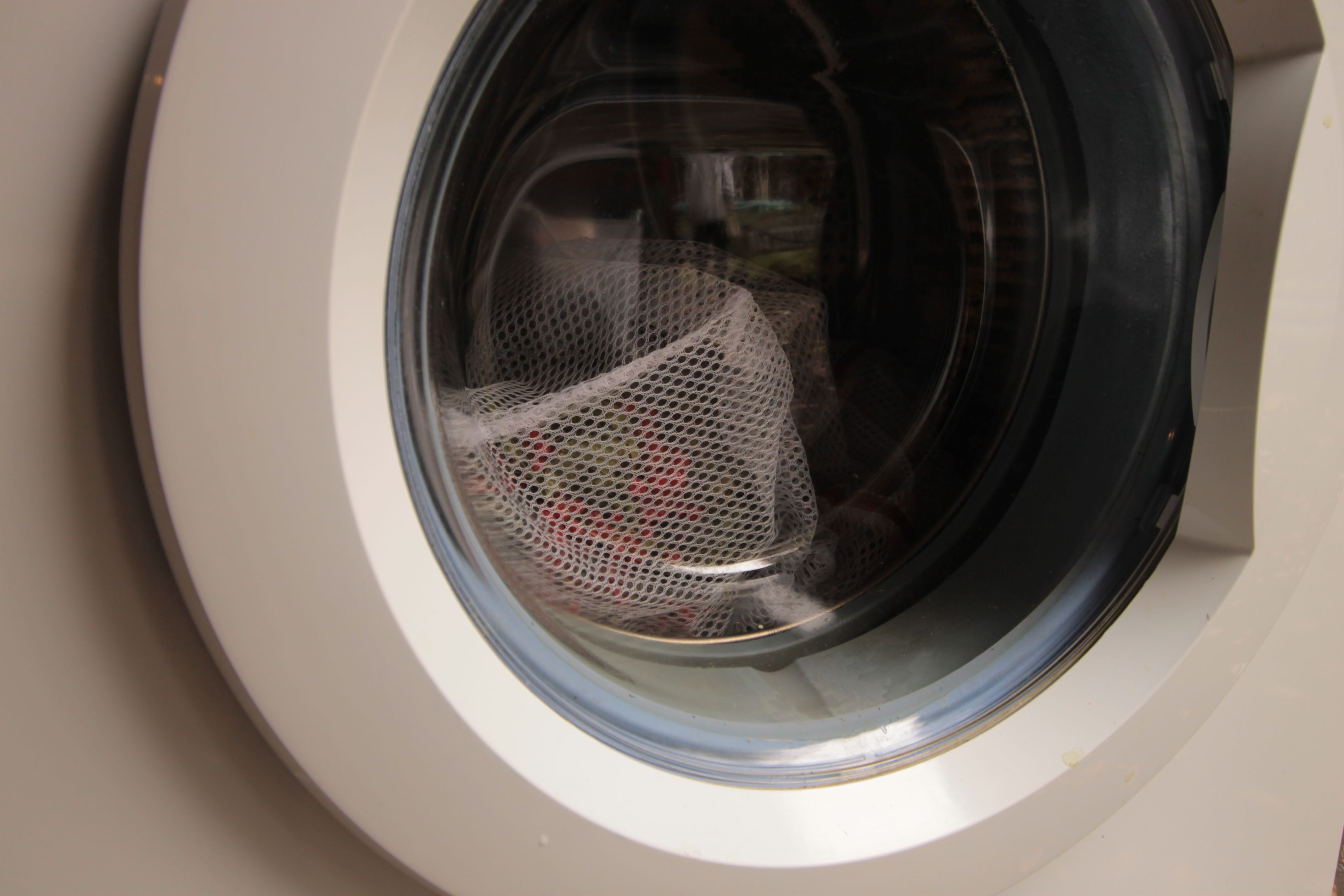 Close-up view of herbal infusion in washing machine for drinking and sauna in PPKK 03.00 by Sarah Ancelle Schoenfeld and Louis-Philippe Scoufaras in Baerenzwinger Berlin