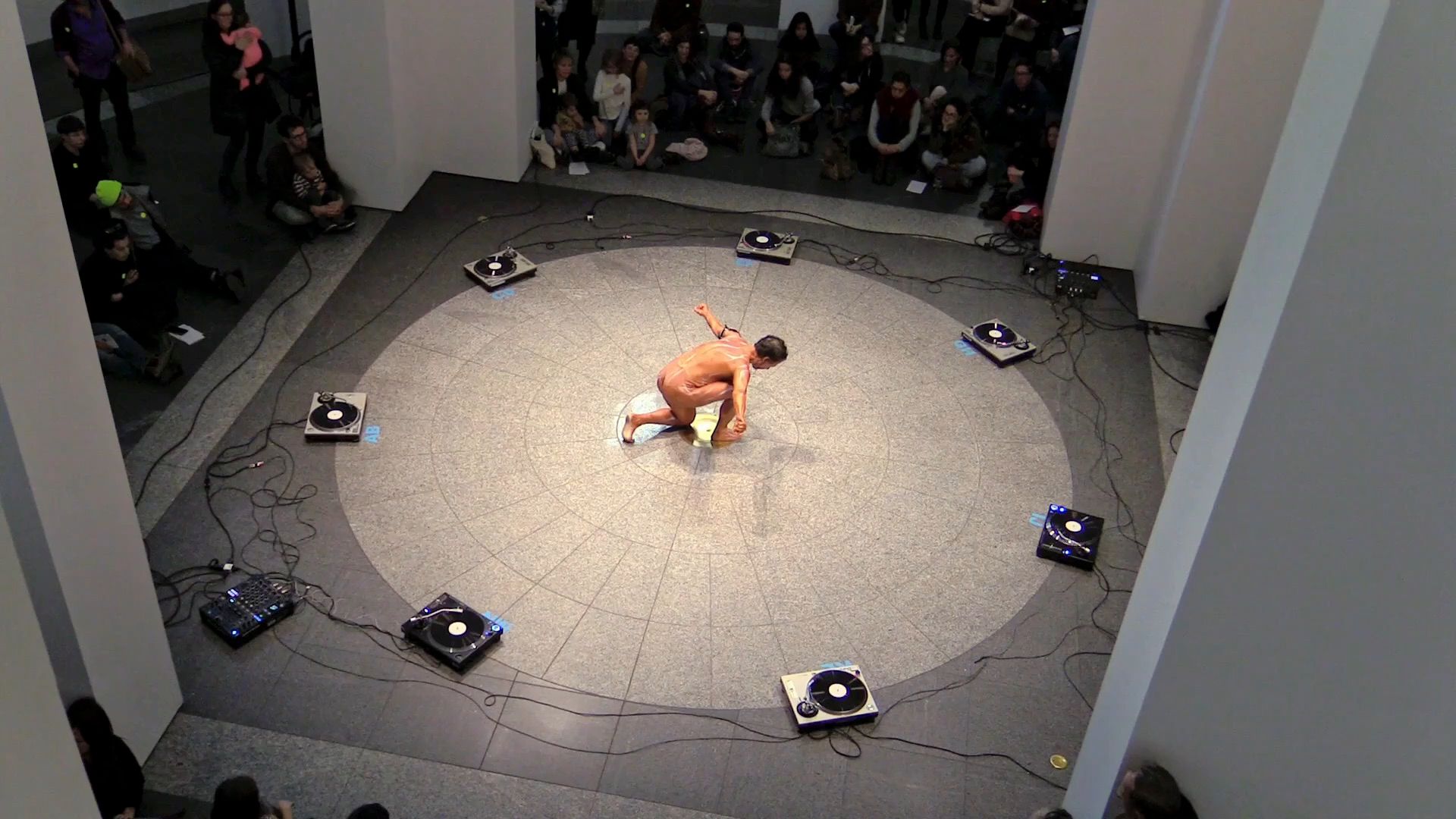 Video still of female bodybuilder performing PPKK 04.01 by Sarah Ancelle Schoenfeld and Louis-Philippe Scoufaras at MAC Montreal