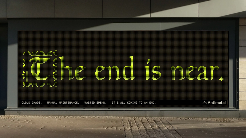 An animated billboard, constructed of atoms (dots), that visualize complexity through shapes/repetition/movement and reveal the text: 'The end is near. [Of] cloud chaos, manual maintenance, wasted spend, it's all coming to an end'